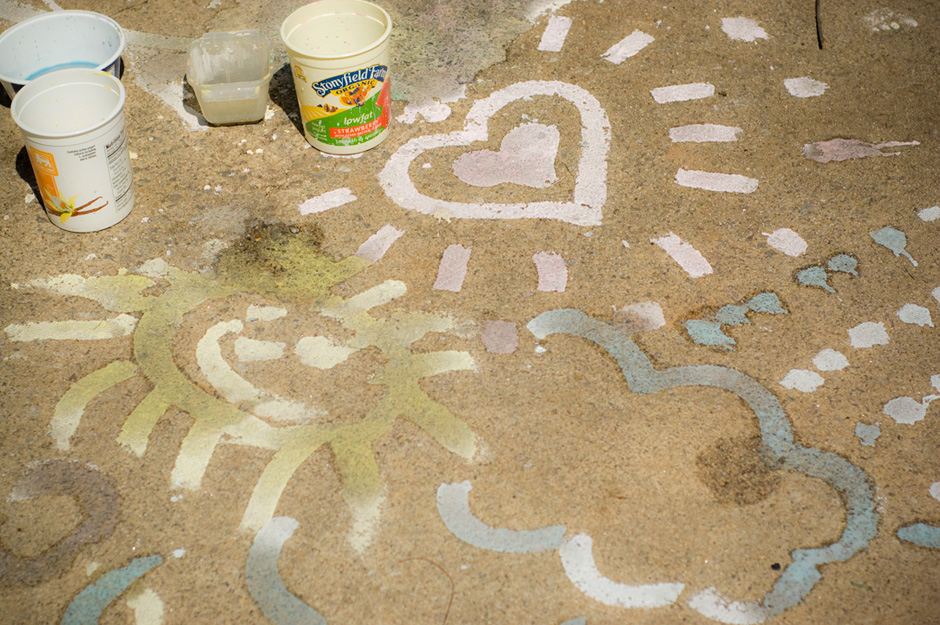 Painting the pavement with sidewalk chalk paint